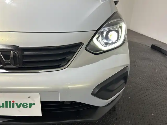 ホンダ フィット e:HEVクロスター 愛媛県 2020(令2)年 8.7万km プレミアムサンライトホワイトパール AA落札成約済み//衝突軽減ブレーキ〈CMBS〉 誤発進抑制機能 後方誤発進抑制機能 近距離衝突軽減ブレーキ 歩行者事故低減ステアリング 路外逸脱抑制機能 渋滞追従機能付アダプティブ・クルーズ・コントロール〈ACC〉 車線維持支援システム〈LKAS〉 先行車発進お知らせ機能 標識認識機能 オートハイビーム 純正SDナビ Bluetooth　フルセグ　バックカメラ　親水/ヒーテッドドアミラー　熱線入りフロントウインドウ　PTCヒーター