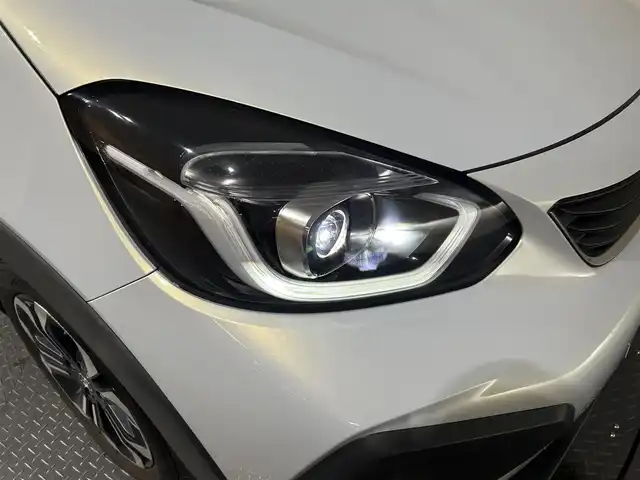 ホンダ フィット e:HEVクロスター 愛媛県 2020(令2)年 8.7万km プレミアムサンライトホワイトパール AA落札成約済み//衝突軽減ブレーキ〈CMBS〉 誤発進抑制機能 後方誤発進抑制機能 近距離衝突軽減ブレーキ 歩行者事故低減ステアリング 路外逸脱抑制機能 渋滞追従機能付アダプティブ・クルーズ・コントロール〈ACC〉 車線維持支援システム〈LKAS〉 先行車発進お知らせ機能 標識認識機能 オートハイビーム 純正SDナビ Bluetooth　フルセグ　バックカメラ　親水/ヒーテッドドアミラー　熱線入りフロントウインドウ　PTCヒーター