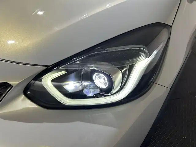 ホンダ フィット e:HEVクロスター 愛媛県 2020(令2)年 8.7万km プレミアムサンライトホワイトパール AA落札成約済み//衝突軽減ブレーキ〈CMBS〉 誤発進抑制機能 後方誤発進抑制機能 近距離衝突軽減ブレーキ 歩行者事故低減ステアリング 路外逸脱抑制機能 渋滞追従機能付アダプティブ・クルーズ・コントロール〈ACC〉 車線維持支援システム〈LKAS〉 先行車発進お知らせ機能 標識認識機能 オートハイビーム 純正SDナビ Bluetooth　フルセグ　バックカメラ　親水/ヒーテッドドアミラー　熱線入りフロントウインドウ　PTCヒーター