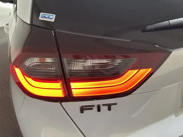 ホンダ フィット e:HEVクロスター 愛媛県 2020(令2)年 8.7万km プレミアムサンライトホワイトパール AA落札成約済み//衝突軽減ブレーキ〈CMBS〉 誤発進抑制機能 後方誤発進抑制機能 近距離衝突軽減ブレーキ 歩行者事故低減ステアリング 路外逸脱抑制機能 渋滞追従機能付アダプティブ・クルーズ・コントロール〈ACC〉 車線維持支援システム〈LKAS〉 先行車発進お知らせ機能 標識認識機能 オートハイビーム 純正SDナビ Bluetooth　フルセグ　バックカメラ　親水/ヒーテッドドアミラー　熱線入りフロントウインドウ　PTCヒーター