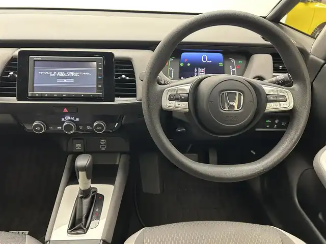 ホンダ フィット e:HEVクロスター 愛媛県 2020(令2)年 8.7万km プレミアムサンライトホワイトパール AA落札成約済み//衝突軽減ブレーキ〈CMBS〉 誤発進抑制機能 後方誤発進抑制機能 近距離衝突軽減ブレーキ 歩行者事故低減ステアリング 路外逸脱抑制機能 渋滞追従機能付アダプティブ・クルーズ・コントロール〈ACC〉 車線維持支援システム〈LKAS〉 先行車発進お知らせ機能 標識認識機能 オートハイビーム 純正SDナビ Bluetooth　フルセグ　バックカメラ　親水/ヒーテッドドアミラー　熱線入りフロントウインドウ　PTCヒーター