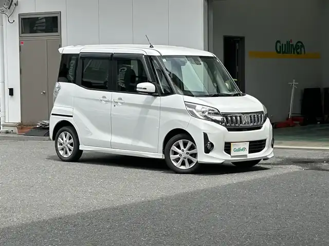 三菱 ｅＫスペース カスタムG e－アシスト 宮城県 2015(平27)年 8.1万km シルキーホワイト 社外メモリナビ（AM/FM）/バックカメラ/両側パワースライドドア/4WD/横滑り防止/追突軽減/アイドリングストップ/純正フロアマット/純正エンジンスターター/ベンチシート/純正１４インチアルミホイール/Wエアバッグ＋サイド/スマートキー/社外アルミホイールスタッドレスタイヤ/プッシュスタート/ETC/保証書/取扱説明書