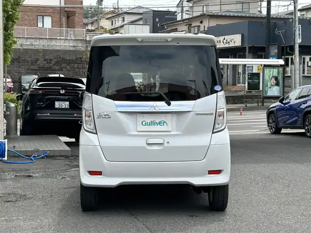 三菱 ｅＫスペース カスタムG e－アシスト 宮城県 2015(平27)年 8.1万km シルキーホワイト 社外メモリナビ（AM/FM）/バックカメラ/両側パワースライドドア/4WD/横滑り防止/追突軽減/アイドリングストップ/純正フロアマット/純正エンジンスターター/ベンチシート/純正１４インチアルミホイール/Wエアバッグ＋サイド/スマートキー/社外アルミホイールスタッドレスタイヤ/プッシュスタート/ETC/保証書/取扱説明書