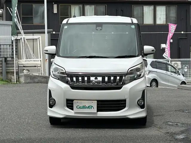 三菱 ｅＫスペース カスタムG e－アシスト 宮城県 2015(平27)年 8.1万km シルキーホワイト 社外メモリナビ（AM/FM）/バックカメラ/両側パワースライドドア/4WD/横滑り防止/追突軽減/アイドリングストップ/純正フロアマット/純正エンジンスターター/ベンチシート/純正１４インチアルミホイール/Wエアバッグ＋サイド/スマートキー/社外アルミホイールスタッドレスタイヤ/プッシュスタート/ETC/保証書/取扱説明書