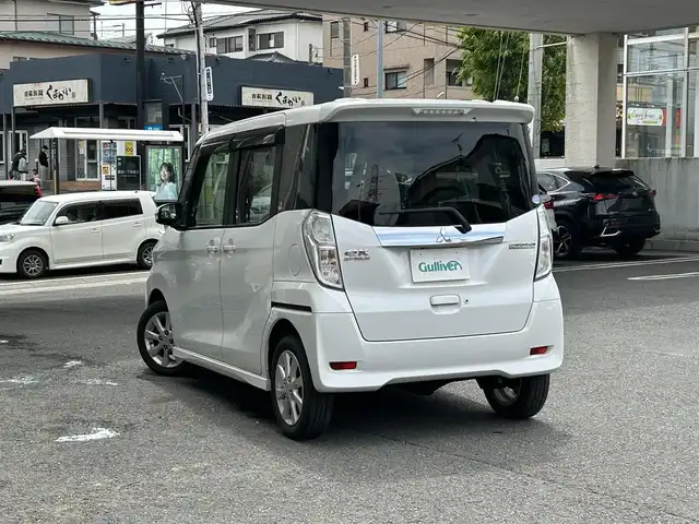 三菱 ｅＫスペース カスタムG e－アシスト 宮城県 2015(平27)年 8.1万km シルキーホワイト 社外メモリナビ（AM/FM）/バックカメラ/両側パワースライドドア/4WD/横滑り防止/追突軽減/アイドリングストップ/純正フロアマット/純正エンジンスターター/ベンチシート/純正１４インチアルミホイール/Wエアバッグ＋サイド/スマートキー/社外アルミホイールスタッドレスタイヤ/プッシュスタート/ETC/保証書/取扱説明書