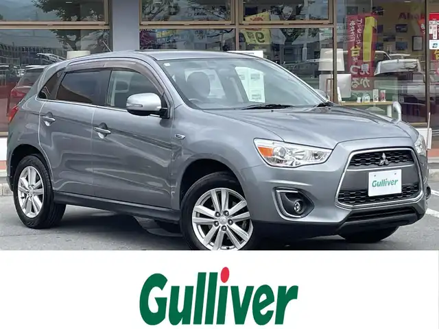 三菱 ＲＶＲ G 長野県 2013(平25)年 11.3万km ガンＭ 社外ナビ（CD、DVD、IPOD、AUX）/バックカメラ/ワンセグテレビ/社外ETC/アイドリングストップ/横滑り防止装置/盗難防止装置/純正フロアマット/ダブルエアバック/ハロゲンヘッドライト/純正ドアバイザー/社外スタッドレス積み込み/４WD/取扱説明書