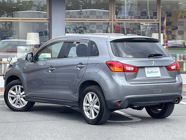 三菱 ＲＶＲ G 長野県 2013(平25)年 11.3万km ガンＭ 社外ナビ（CD、DVD、IPOD、AUX）/バックカメラ/ワンセグテレビ/社外ETC/アイドリングストップ/横滑り防止装置/盗難防止装置/純正フロアマット/ダブルエアバック/ハロゲンヘッドライト/純正ドアバイザー/社外スタッドレス積み込み/４WD/取扱説明書