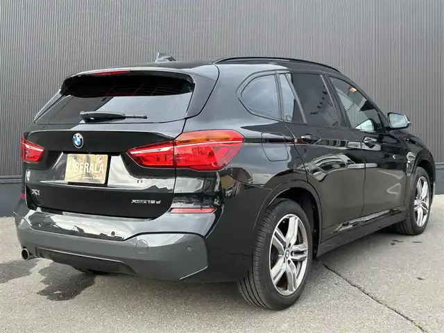 ＢＭＷ Ｘ１ xDrive 18d Mスポーツ 道東・釧路十勝 2019(令1)年 1.4万km サファイアブラックP 純正HDDナビ/BT/USB/シートヒーター(前席)/パワーバックドア/フットトランクオープナー/純正ドライブレコーダー(前後)/革巻ステアリング/リモコン/パドルシフト/プッシュスタート/スマートキー/LEDヘッドライト/オートライト/フロント/リアフォグライト/純正18インチAW/純正フロアマット/インテリジェントセーフティ/ミラーETC