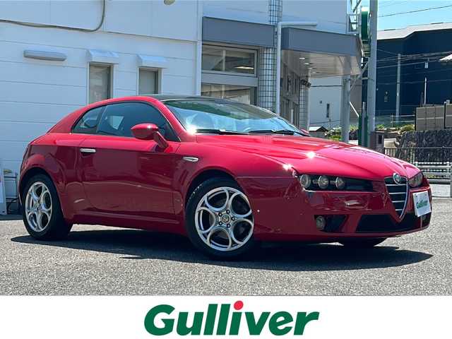 アルファロメオ ブレラ 2．2 JTS 愛知県 2006(平18)年 7.6万km アルファレッド /禁煙車//左ハンドル//6MT//社外オーディオ//キーレスエントリー//電動格納ミラー//ETC//純正１７インチアルミ//HIDライト//リアパーキングセンサー//純正フロアマット