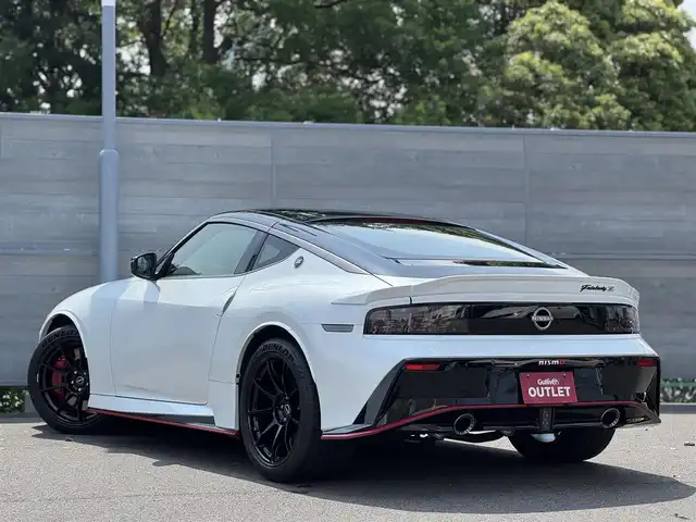 日産 フェアレディ Ｚ ニスモ 三重県 2025(令7)年 0.1万km パールⅡ 先進運転支援技術/・インテリジェントクルーズコントロール/・前方衝突予測警報/・インテリジェントエマージェンシーブレーキ/・踏み間違い衝突防止アシスト/・車線逸脱警報/・後側方車両検知警報/・後退時車両検知警報/NissanConnectナビゲーションシステム/・メモリーナビ/・9インチワイドディスプレイ/・地デジTV/・Bluetooth/・ハンズフリーフォン/・ボイスコマンド/・USB端子/・AppleCarPlay/AndroidAuto/・AmazonAlexa/BOSEサウンドシステム(8スピーカー)/バックモニター/クリアランスソナー/ブラック/レッドツートーンRECARO製革/アルカンターラコンビスポーツシート/レッドセンターマーク付レッドステッチ入アルカンターラ巻きコンビステアリングホイール/・ステアリングスイッチ/・パドルシフト/3連サブメーター/ビルトインETC2.0/純正19インチRAYS製9本スポークブラック塗装鍛造アルミホイール/レッドブレーキキャリパー/専用サスペンション/LEDヘッドランプ/・オートライト/LEDフロントフォグランプ/プッシュエンジンスタート/インテリジェントキー×2/新車時保証書/取扱説明書