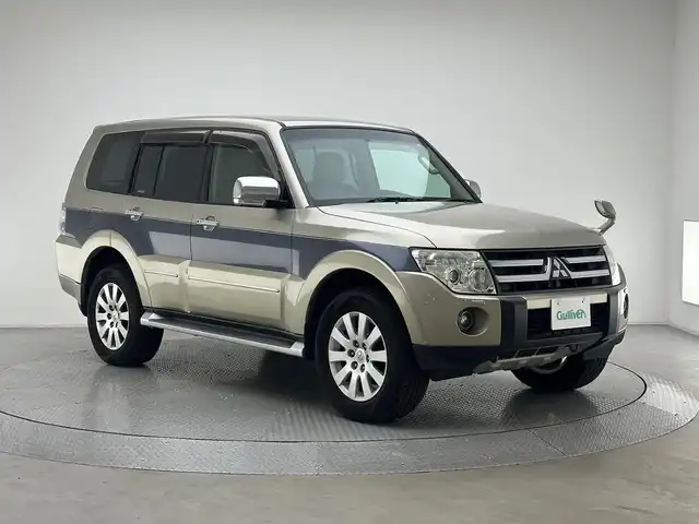 三菱 パジェロ ロング スーパーエクシード 兵庫県 2006(平18)年 8.6万km プラチナベージュM/ダークブルーイッシュグレーマイカ 純正HDDナビ(CD/DVD)/4WD/レザーシート/パワーシート/シートヒーター/バックカメラ/ROCKFORDサウンド/クルーズコントロール/サイドステップ/HIDヘッドライト/フォグライト/純正18インチアルミホイール/純正フロアマット