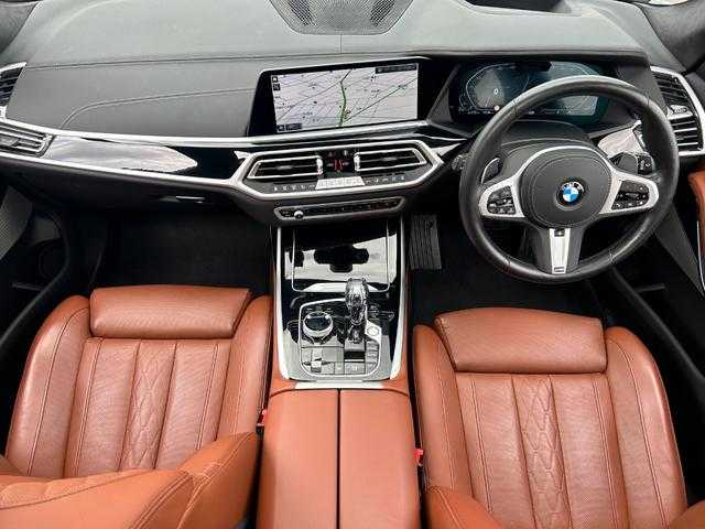 ＢＭＷ ＢＭＷ Ｘ７ 埼玉県 2021(令3)年 4.4万km パール ワンオーナー/茶革シート/純正HDDナビ/（Bluetooth/USB/CD/DVD/USB/フルセグ）/パノラマガラスサンルーフ/ウェルネスＰＫＧ/ヘッドアップディスプレイ/ｈａｒｍａｎ／ｋａｒｄｏｎ/リアエンターテインメント/全周囲カメラ/純正ＥＴＣ