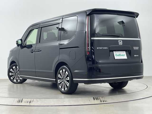 ホンダ ステップワゴン スパーダ eHEV プレミアムライン 埼玉県 2024(令6)年 1.7万km クリスタルブラックパール 純正11．4型SDナビ/（BT/DVD/CD/AM/FM/フルセグTV）/後席モニター/両側パワースライドドア/BSM/前後ドライブレコーダー/ホンダセンシング/・衝突軽減ブレーキ/・誤発進抑制機能/・車線維持支援システム/・アダプティブクルーズコントロール/ハーフレザーシート/シートヒーター/ビルトインETC/前列USB端子/純正アルミホイール