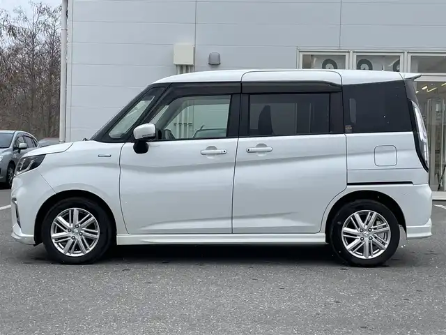 スズキ ソリオ HV MZ 青森県 2021(令3)年 7.3万km ピュアホワイトP ワンオーナー/4WD/セーフティサポート/・デュアルカメラブレーキサポート/・後退時ブレーキサポート/・誤発進抑制機能/・アダプティブクルーズコントロール/・ブラインドスポットモニター/・車線逸脱抑制機能/・ハイビームアシスト/・ヘッドアップディスプレイ/社外メモリナビ/　 CD/DVD/SD/BT/フルセグTV/両側パワースライドドア/LEDオートライト/フォグランプ/純正15インチアルミホイール/シートヒーター/純正エンジンスターター/アイドリングストップ/スマートキー