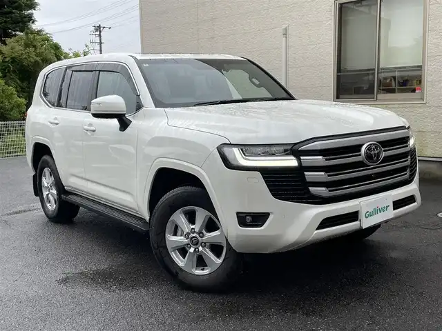 トヨタ ランドクルーザー AX 静岡県 2024(令6)年 0.3万km ホワイトパールクリスタルシャイン ワンオーナー/サンルーフ/純正ナビ/フルセグTV/DVD/CD/SD/BT/全方位カメラ/黒革調シートカバー/プリクラッシュセーフティ/レーンキープアシスト/オートハイビーム/レーダークルーズコントロール/ブラインドスポットモニター/クリアランスソナー/AC100V電源/ビルトインETC2.0/運転席パワーシート/LEDヘッドライト/LEDフォグライト/スマートキー×2/保証書/取扱説明書/ナビ取扱説明書