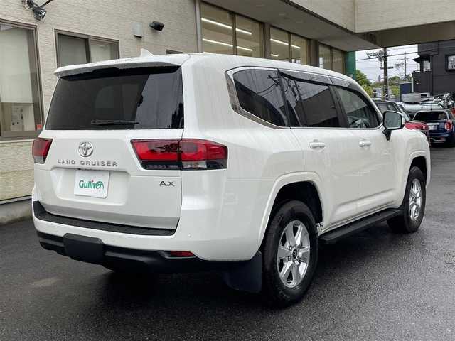 トヨタ ランドクルーザー AX 静岡県 2024(令6)年 0.3万km ホワイトパールクリスタルシャイン ワンオーナー/サンルーフ/純正ナビ/フルセグTV/DVD/CD/SD/BT/全方位カメラ/黒革調シートカバー/プリクラッシュセーフティ/レーンキープアシスト/オートハイビーム/レーダークルーズコントロール/ブラインドスポットモニター/クリアランスソナー/AC100V電源/ビルトインETC2.0/運転席パワーシート/LEDヘッドライト/LEDフォグライト/スマートキー×2/保証書/取扱説明書/ナビ取扱説明書