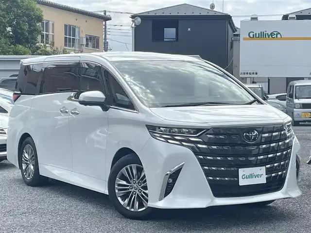 トヨタ アルファードハイブリット Z 埼玉県 2024(令6)年 1万km プラチナホワイトパールマイカ ワンオーナー/左右独立ムーンルーフ/レザーシート/前席２列目エアシート＆シートヒーター/Ｄ席メモリー付前席２列目パワーシート/純正メモリナビ＆フルセグＴＶ/（ＵＳＢ＆ＢＴ）/全方位モニター/ビルトインＥＴＣ（２．０）/デジタルインナーミラー/Ｔｏｙｏｔａ　Ｓａｆｅｔｙ　Ｓｅｎｓｅ/・ＡＨＳ/・ＰＣＳ/・ＬＴＡ/・ＬＤＡ/・ＬＣＡ/・ＦＣＴＡ/・ＰＤＡ/・発進遅れ告知機能/・ＲＳＡ/・レーダークルーズコントロール/・ドライバー異常時対応システム/・ドライバーモニター/ＲＣＴＡ/ＰＫＳＢ/ＢＭＳ/クリアランスソナー/置くだけ充電/安心降車アシスト/両側パワースライドドア/ステアリングヒーター/ウッドコンビステアリング/ステアリングリモコン/電動パーキングブレーキ/オートホールド/パワーバックドア/純正１８inアルミホイール/（スタッドレスタイヤ積込）/オートライト/ＬＥＤライト/フォグランプ/電動格納ミラー/スマートキー/プッシュスタート/Ｗ＆サイド＆カーテンエアバッグ/続きは検査員入力