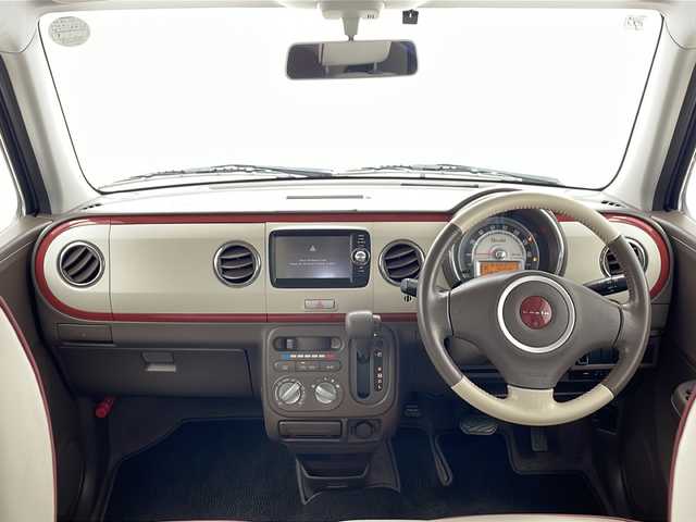 スズキ ラパン ショコラ G 千葉県 2015(平27)年 5.1万km キャンドルオレンジメタリック 禁煙車/社外SDナビ/オートライト/バックカメラ/ETC/AC/純正フロアマット/キセノンヘッドライト/Wエアバック/アイドリングストップ/合皮レザーシート/電格ミラー/ドアバイザー/スマートキー/スタートボタン