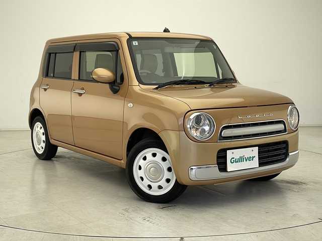 スズキ ラパン ショコラ G 千葉県 2015(平27)年 5.1万km キャンドルオレンジメタリック 禁煙車/社外SDナビ/オートライト/バックカメラ/ETC/AC/純正フロアマット/キセノンヘッドライト/Wエアバック/アイドリングストップ/合皮レザーシート/電格ミラー/ドアバイザー/スマートキー/スタートボタン