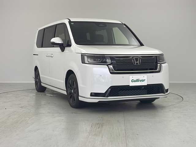 ホンダ ステップワゴン スパーダ 茨城県 2025(令7)年 0.1千km プラチナホワイトパール ワンオーナー　純正１１．４型メモリーナビ　衝突軽減ブレーキ　フルセグＴＶ　両側電動スライドドア　シートヒーター　バックカメラ　ＬＥＤライト　ＰＣＳ　クリアランスソナー　横滑り防止装置　クルコン　禁煙車