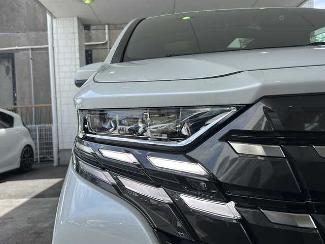 トヨタ アルファードハイブリット Z 京都府 2023(令5)年 1.5万km プラチナホワイトパールマイカ 純正ディスプレイオーディオナビ/フルセグTV/Bluetooth/Miracast/HDMI/FM/AM/全方位カメラ/ツインムーンルーフ/3眼LEDヘッドライト/後席用パワーサンシェード/両側パワースライドドア/パワーバックドア/運転席ポジションメモリー/全席パワーシート/全席シートヒーター/全席エアーシート/ステアリングヒーター/ステアリングスイッチ/前後ドラレコ/ビルトインETC2.0/純正フロアマット/純正ドアバイザー/電格ウィンカーミラー/トヨタセーフティセンス/BSM/置くだけ充電/禁煙車