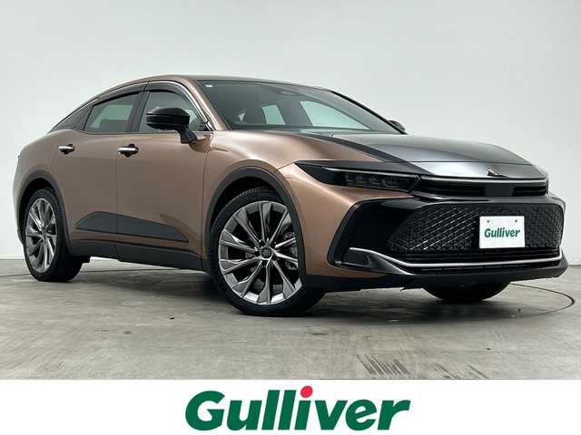 トヨタ クラウン クロスオーバー Z 三重県 2024(令6)年 1.2万km 茶Ｍ /禁煙車//純正ナビ/　フルセグTV/Bluetooth/Applecarplay//全方位カメラ//全席イージークローザー//デジタルインナーミラー//置くだけ充電//パワーイージーアクセスシステム//メモリーシート//前席シートヒーター//前席ベンチレーション//ハンドルヒーター//HUD//BSM//レーダークルーズコントロール//ドアバイザー//純正アルミホイール//ETC2.0//前席パワーシート//プッシュスタート//スマートキー//スペアキー//100V充電