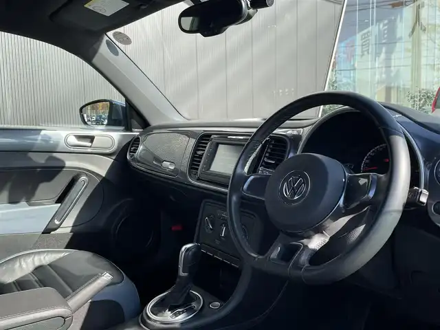 フォルクスワーゲン ザ・ビートル デザイン レザーパッケージ 長野県 2015(平27)年 3.5万km グレー ブラックレザーシート / シートヒーター / 純正ナビ / 地デジTV / bluetooth / CD DVD / クルーズコントロール / プッシュスタート / スマートキー / 16インチAW / ETC / HIDヘッドライト / オートライト / AUX