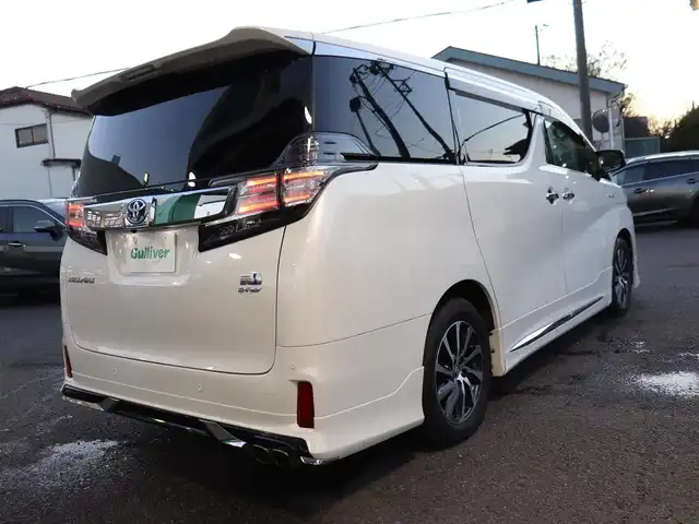 トヨタ ヴェルファイア ハイブリット ZR Gエディション 神奈川県 2016(平28)年 3.8万km ホワイトパールクリスタルシャイン モデリスタエアロ/モデリスタマフラー/寒冷地仕様/純正１０型ナビ/フルセグＴＶ/置くだけ充電/インテリアイルミネーション/ＴＶキャンセラー/ステアリングヒーター/前席シートヒーター/パワーバックドア/オートマチックハイビーム/ETC/両側パワースライドドア/黒革シート/クルーズコントロール