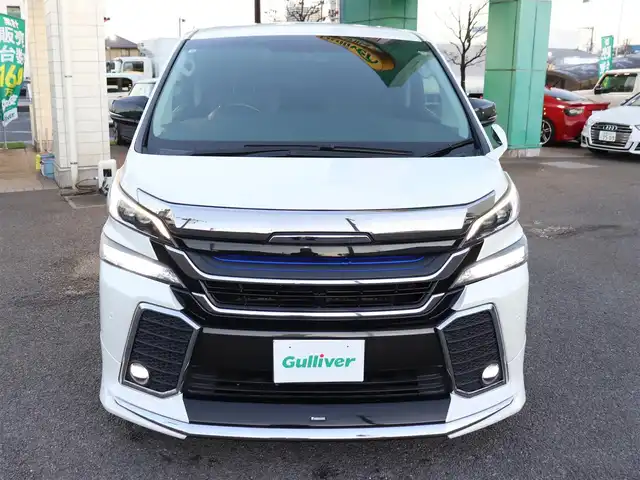 トヨタ ヴェルファイア ハイブリット ZR Gエディション 神奈川県 2016(平28)年 3.8万km ホワイトパールクリスタルシャイン モデリスタエアロ/モデリスタマフラー/寒冷地仕様/純正１０型ナビ/フルセグＴＶ/置くだけ充電/インテリアイルミネーション/ＴＶキャンセラー/ステアリングヒーター/前席シートヒーター/パワーバックドア/オートマチックハイビーム/ETC/両側パワースライドドア/黒革シート/クルーズコントロール
