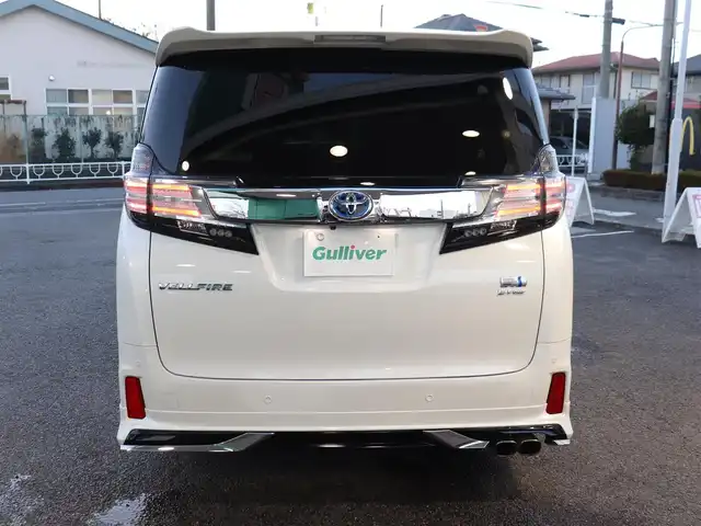 トヨタ ヴェルファイア ハイブリット ZR Gエディション 神奈川県 2016(平28)年 3.8万km ホワイトパールクリスタルシャイン モデリスタエアロ/モデリスタマフラー/寒冷地仕様/純正１０型ナビ/フルセグＴＶ/置くだけ充電/インテリアイルミネーション/ＴＶキャンセラー/ステアリングヒーター/前席シートヒーター/パワーバックドア/オートマチックハイビーム/ETC/両側パワースライドドア/黒革シート/クルーズコントロール