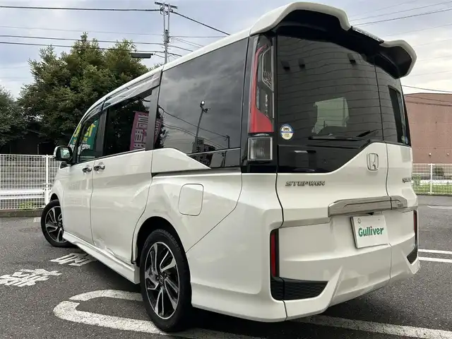 ホンダ ステップワゴン スパーダ クールスピリット 埼玉県 2017(平29)年 10.2万km ホワイトオーキッドパール ワンオーナー/Honda SENSING/・衝突軽減ブレーキ (CMBS)/・路外逸脱抑制機能/・渋滞追従機能付アダプティブクルーズコントロール/　 (ACC)/・車線維持支援システム (LKAS)/純正9インチメモリナビ　（VXM-175VFNi）/DTV/CD/DVD/BT/USB/iPod/AUX/AppleCarPlay/SD/SDREC/両側パワースライドドア/パドルシフト/前席ヒートシーター/純正ビルトインETC　/社外前後ドライブレコーダー（CSD-790FHG）/スマートキー/スペアキー/VSA（ビークルスタビリティアシスト）/　・ABS機能　/　・TCS（トラクションコントロールシステム）機能/　・横滑り抑制機能/盗難防止装置　/アイドリングストップ