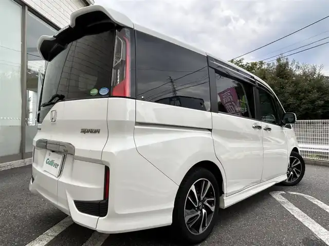ホンダ ステップワゴン スパーダ クールスピリット 埼玉県 2017(平29)年 10.2万km ホワイトオーキッドパール ワンオーナー/Honda SENSING/・衝突軽減ブレーキ (CMBS)/・路外逸脱抑制機能/・渋滞追従機能付アダプティブクルーズコントロール/　 (ACC)/・車線維持支援システム (LKAS)/純正9インチメモリナビ　（VXM-175VFNi）/DTV/CD/DVD/BT/USB/iPod/AUX/AppleCarPlay/SD/SDREC/両側パワースライドドア/パドルシフト/前席ヒートシーター/純正ビルトインETC　/社外前後ドライブレコーダー（CSD-790FHG）/スマートキー/スペアキー/VSA（ビークルスタビリティアシスト）/　・ABS機能　/　・TCS（トラクションコントロールシステム）機能/　・横滑り抑制機能/盗難防止装置　/アイドリングストップ
