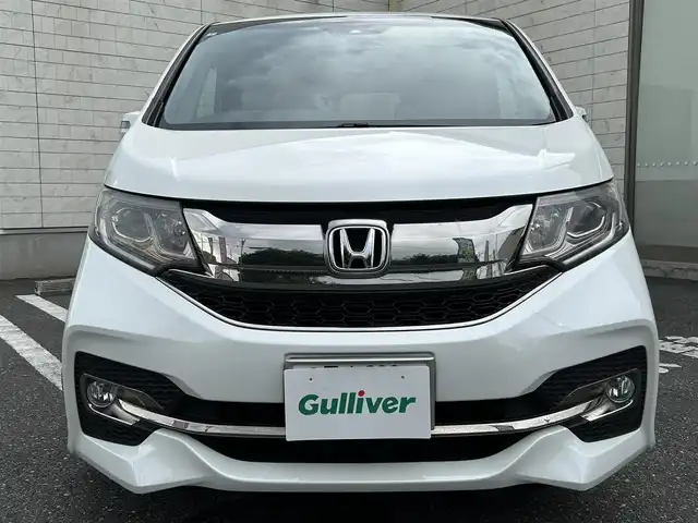 ホンダ ステップワゴン スパーダ クールスピリット 埼玉県 2017(平29)年 10.2万km ホワイトオーキッドパール ワンオーナー/Honda SENSING/・衝突軽減ブレーキ (CMBS)/・路外逸脱抑制機能/・渋滞追従機能付アダプティブクルーズコントロール/　 (ACC)/・車線維持支援システム (LKAS)/純正9インチメモリナビ　（VXM-175VFNi）/DTV/CD/DVD/BT/USB/iPod/AUX/AppleCarPlay/SD/SDREC/両側パワースライドドア/パドルシフト/前席ヒートシーター/純正ビルトインETC　/社外前後ドライブレコーダー（CSD-790FHG）/スマートキー/スペアキー/VSA（ビークルスタビリティアシスト）/　・ABS機能　/　・TCS（トラクションコントロールシステム）機能/　・横滑り抑制機能/盗難防止装置　/アイドリングストップ