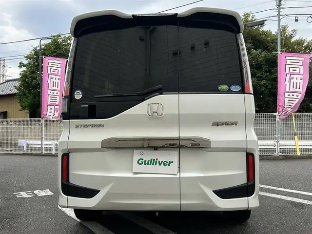 ホンダ ステップワゴン スパーダ クールスピリット 埼玉県 2017(平29)年 10.2万km ホワイトオーキッドパール ワンオーナー/Honda SENSING/・衝突軽減ブレーキ (CMBS)/・路外逸脱抑制機能/・渋滞追従機能付アダプティブクルーズコントロール/　 (ACC)/・車線維持支援システム (LKAS)/純正9インチメモリナビ　（VXM-175VFNi）/DTV/CD/DVD/BT/USB/iPod/AUX/AppleCarPlay/SD/SDREC/両側パワースライドドア/パドルシフト/前席ヒートシーター/純正ビルトインETC　/社外前後ドライブレコーダー（CSD-790FHG）/スマートキー/スペアキー/VSA（ビークルスタビリティアシスト）/　・ABS機能　/　・TCS（トラクションコントロールシステム）機能/　・横滑り抑制機能/盗難防止装置　/アイドリングストップ