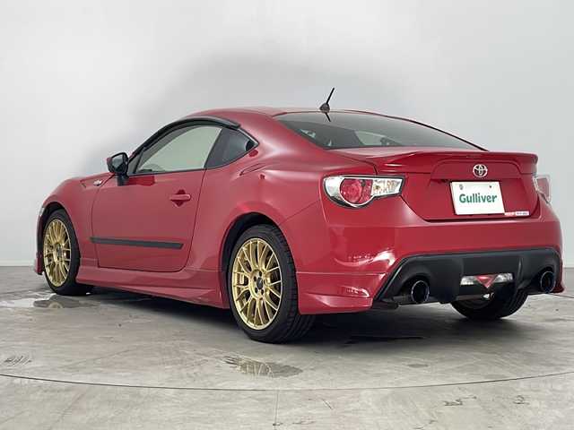 トヨタ ８６ GT 鹿児島県 2013(平25)年 12.1万km ライトニングレッド 社外SDナビ/（AM/FM/CD/DVD/Bluetooth）/バックカメラ/モデリスタエアロ/パドルシフト/ガナドール製マフラー/社外AW（ENKEI）/純正フロアマット/スマートキー /AAC/オートライト