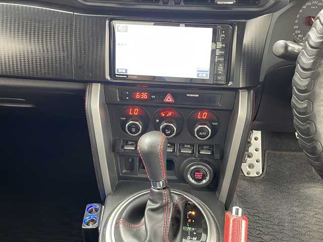 トヨタ ８６ GT 鹿児島県 2013(平25)年 12.1万km ライトニングレッド 社外SDナビ/（AM/FM/CD/DVD/Bluetooth）/バックカメラ/モデリスタエアロ/パドルシフト/ガナドール製マフラー/社外AW（ENKEI）/純正フロアマット/スマートキー /AAC/オートライト