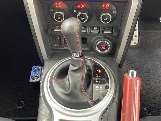 トヨタ ８６ GT 鹿児島県 2013(平25)年 12.1万km ライトニングレッド 社外SDナビ/（AM/FM/CD/DVD/Bluetooth）/バックカメラ/モデリスタエアロ/パドルシフト/ガナドール製マフラー/社外AW（ENKEI）/純正フロアマット/スマートキー /AAC/オートライト