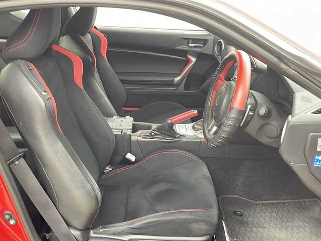 トヨタ ８６ GT 鹿児島県 2013(平25)年 12.1万km ライトニングレッド 社外SDナビ/（AM/FM/CD/DVD/Bluetooth）/バックカメラ/モデリスタエアロ/パドルシフト/ガナドール製マフラー/社外AW（ENKEI）/純正フロアマット/スマートキー /AAC/オートライト