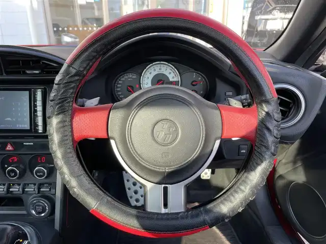 トヨタ ８６ GT 三重県 2013(平25)年 12.1万km ライトニングレッド (株)IDOMが運営する【じしゃロン四日市店】の自社ローン専用車両になります。こちらは現金またはオートローンご利用時の価格です。自社ローンご希望の方は別途その旨お申付け下さい/社外SDナビ/（AM/FM/CD/DVD/Bluetooth）/バックカメラ/モデリスタエアロ/パドルシフト/ガナドール製マフラー/社外AW（ENKEI）/純正フロアマット/スマートキー /AAC/オートライト