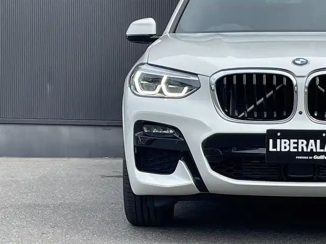 ＢＭＷ Ｘ３ xDrive20d Mスポーツ 香川県 2021(令3)年 3.1万km 白 インテリジェントセーフティー/レーンアシスト/ブラインドスポットモニター/F/Rドライブレコーダー/ハーフレザーシート/D/Nシートヒーター/純正ナビ/地デジ/BT/USB/AppleCarPlay/ワイヤレス充電/ヘッドアップディスプレイ/スマートキー/ACC/パドルシフト/純正19インチアルミ/コーナーセンサー/全方位/バックカメラ