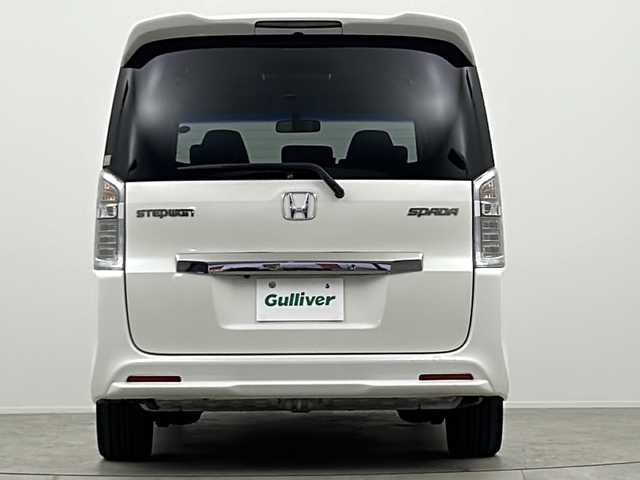 ホンダ ステップワゴン スパーダ Z クールスピリット 大阪府 2014(平26)年 6.2万km ホワイトオーキッドパール 純正９型ナビ（VXM-155VFNi）/（ＣＤ　ＤＶＤ　ＳＤ　ＵＳＢ　ＢＴ　フルセグＴＶ）/フリップダウンモニター　/バックカメラ　/ビルトインＥＴＣ　/両側パワースライドドア　/クルーズコントロール　/アイドリングストップ　/ハーフレーザーシート　/ＨＩＤ/スマートキー/スペアキーあり/純正フロアマット