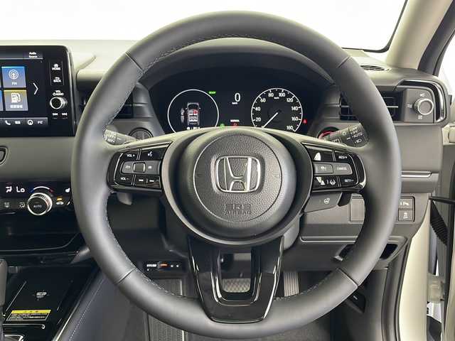 ホンダ ヴェゼル ハイブリッド e:HEV Z 茨城県 2025(令7)年 0.1千km プラチナホワイトパール 純正９型ディスプレイオーディオナビ　バックカメラ　ワイヤレス充電　ビルトインＥＴＣ２．０　アダプティブクルーズコントロール　衝突被害軽減ブレーキ　ブラインドスポットモニター　ＬＥＤオートライト　禁煙車