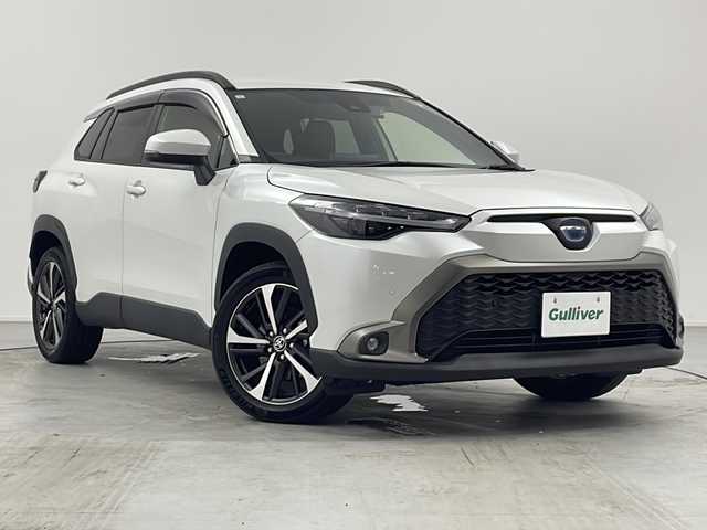 トヨタ カローラ クロス ハイブリッド Z 愛知県 2023(令5)年 2.1万km プラチナホワイトパールマイカ 禁煙車/ワンオーナー/ディスプレイオーディオ/ビルトインＥＴＣ/前後ドライブレコーダー/クリアランスソナー/クルーズコントロール/パワーシート/シートヒーター/ステアリングスイッチ/革巻きステアリング/ＬＴＡ/ＰＣＳ/ＰＫＳＢ/ＲＳＡ/電動パーキング/オートホールド/照明付きバニティーミラー/横滑り防止装置/オートライト/オートマチックハイビーム/フォグランプ/プッシュスタート/スマートキー/スペアキー/純正フロアマット/純正ドアバイザー/ＩＳＯＦＩＸ/取扱説明書/保証書