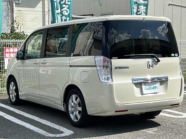 ホンダ ステップワゴン L 兵庫県 2009(平21)年 7.5万km プレミアムヒダマリアイボリーパール OP/・純正HDDインターナビシステム/CD/DVD/地デジTV/・マルチビューカメラ/・スカイルーフ/・純正16インチAW/・フローリングフロア/-/両側パワースライドドア/HIDヘッドランプ/オートライト/ビルトインETC/純正フロアマット/保証書/取説/スペアキー1本