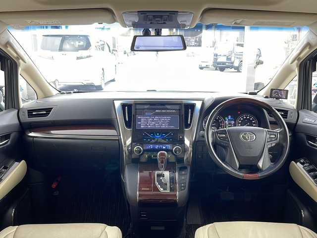 トヨタ アルファード G 兵庫県 2016(平28)年 7.8万km ホワイトパールクリスタルシャイン ・社外10インチナビ/CD/DVD/TV/SD/・社外リアフリップダウンモニター/・バックカメラ　/・プリクラッシュセーフティ/・レーダークルーズコントロール/・クリアランスソナー/・ECO MODE/・前後ドライブレコーダー/・ツインムーンルーフ/・両側パワースライドドア/・パワーバックドア/・ビルトインETC/・運転席メモリー機能付きパワーシート/・前席パワーシート/・オットマン/・nanoe/・LEDヘッドライト/・オートライト/・フォグランプ/・ウィンカーミラー/・オートワイパー/・ウォークスルー/・純正フロアマット/・純正１７インチアルミホイール/・社外レーダー/・社外革調シートカバー/・ドアバイザー/・オールオートパワーウィンドウ/・電動格納ミラー/・スマートキー/・スペアキー