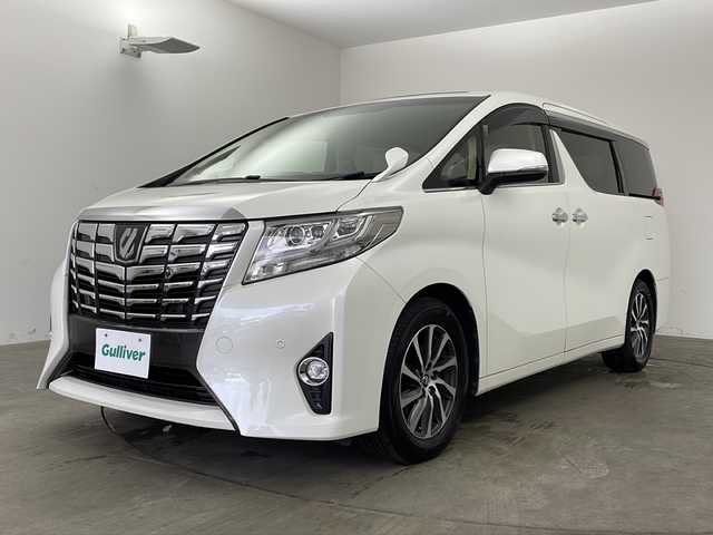 トヨタ アルファード G 兵庫県 2016(平28)年 7.8万km ホワイトパールクリスタルシャイン ・社外10インチナビ/CD/DVD/TV/SD/・社外リアフリップダウンモニター/・バックカメラ　/・プリクラッシュセーフティ/・レーダークルーズコントロール/・クリアランスソナー/・ECO MODE/・前後ドライブレコーダー/・ツインムーンルーフ/・両側パワースライドドア/・パワーバックドア/・ビルトインETC/・運転席メモリー機能付きパワーシート/・前席パワーシート/・オットマン/・nanoe/・LEDヘッドライト/・オートライト/・フォグランプ/・ウィンカーミラー/・オートワイパー/・ウォークスルー/・純正フロアマット/・純正１７インチアルミホイール/・社外レーダー/・社外革調シートカバー/・ドアバイザー/・オールオートパワーウィンドウ/・電動格納ミラー/・スマートキー/・スペアキー