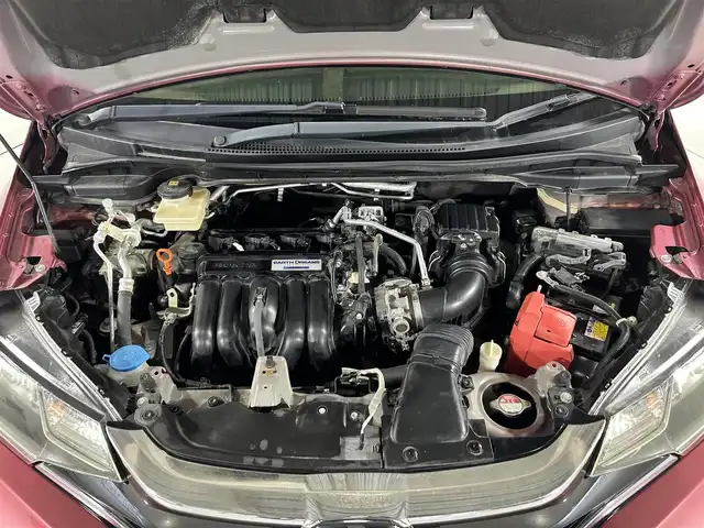 ホンダ フィット ハイブリット S ホンダセンシング 佐賀県 2017(平29)年 2.4万km ルージュアメジストM 純正７型ナビ/(フルセグTV/CD/DVD/Bluetooth/AM/FM/SD)/衝突軽減システム/バックカメラ/コーナーセンサー/レーンキープアシスト/レーダークルーズコントロール/パドルシフト/ＬＥＤヘッドライト/オートライト/フォグライト/純正１６インチアルミホイール/純正フロアマット/ドアバイザー/ビルトインETC/ドライブレコーダー/ステアリングリモコン/先行車発進告知機能/標識検知機能/盗難防止装置/横滑り防止装置/プッシュスタート/スマートキー/スペアキー×１