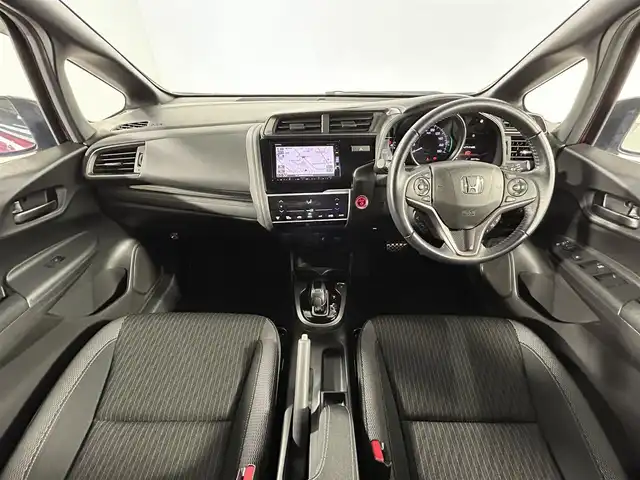 ホンダ フィット ハイブリット S ホンダセンシング 佐賀県 2017(平29)年 2.4万km ルージュアメジストM 純正７型ナビ/(フルセグTV/CD/DVD/Bluetooth/AM/FM/SD)/衝突軽減システム/バックカメラ/コーナーセンサー/レーンキープアシスト/レーダークルーズコントロール/パドルシフト/ＬＥＤヘッドライト/オートライト/フォグライト/純正１６インチアルミホイール/純正フロアマット/ドアバイザー/ビルトインETC/ドライブレコーダー/ステアリングリモコン/先行車発進告知機能/標識検知機能/盗難防止装置/横滑り防止装置/プッシュスタート/スマートキー/スペアキー×１