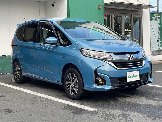ホンダ フリード ハイブリット G ホンダセンシング 京都府 2017(平29)年 3.2万km ブルーホライゾンM 純正メモリナビ　Ｂｌｕｅｔｏｏｔｈオーディオ　ＵＳＢ接続　フルセグ　バックカメラ　フリップダウンモニター　両側パワースライドドア　アダプティブクルーズコントロール　ＬＥＤヘッドライト　ドライブレコーダー