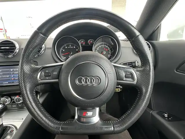 アウディ ＴＴクーペ 1．8 TFSI Sライン 愛知県 2013(平25)年 5万km パール ナビゲーション　/フルセグテレビ　/ＣＤ＆ＤＶＤ　/ブルートゥース　/ＵＳＢ接続　/ミュージックサーバー　/バックカメラ　/ＥＴＣ　/ハーフレザーシート　/キーレス　/社外１９インチアルミホイール　/保証書　/取扱説明書　/整備手帳